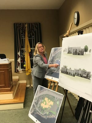 Lisa A. DiGerolamo, professional engineer of the firm PS&S demonstrates with renderings at the Allegro hearing at the March 28 Planning Board meeting.