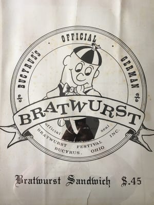 Tim Cook, originally of North Robinson, designed the original Brattie logo for the Bucyrus Bratwurst Festival in 1967.