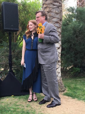 Jessica Chastain poses with Aaron Sorkin who received the Variety Creative Impact Awards for writing. (Jan. 3, 2018)