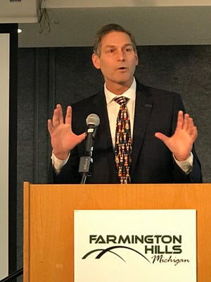 Farmington Public Schools Superintendent Dr. George Heitsch, here speaking at a State of the Cities event, announced he'll retire effective July 1.