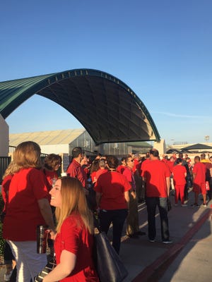 Teachers and supporters at Peoria High School gather on April 11, 2018, in support of the #RedForEd movement before school.