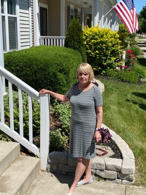 Linda Gadek, shown outside her Dublin home, lost her job on March 21, which means she's been without an income for more than two months. She been denied regular unemployment and pandemic unemployment assistance by the Ohio Department of Job and Family Services.