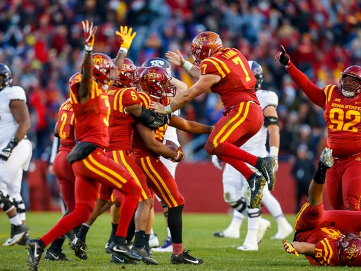 Iowa State Cyclones's Joel Lanning (7) leaps in celebration
