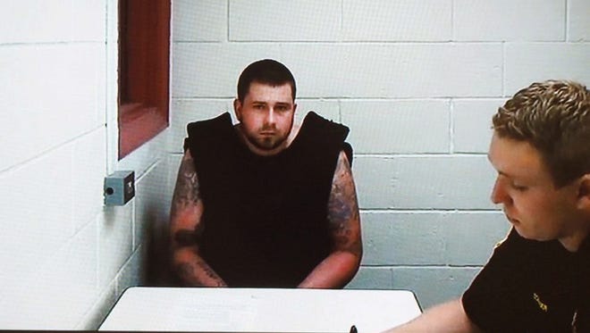 Zachary Patten appears during a video arraignment in St. Joseph County District Court Monday, July 24, 2017, in Centreville, Mich. Felony murder and three more charges were filed against Patten, the suspect in a pair of homicides. Patten, 32, of Portage, is charged with felony murder, open murder, first-degree home invasion and felony firearm in connection with the shooting death of Shane Richardson, who was shot on Thursday, July 20 in Florence Township, just north of the Indiana state line. Patten also is a suspect in the fatal shooting of a woman in Kalamazoo.