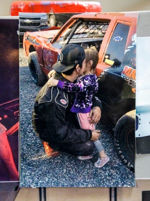 A picture of Matt Schuh with his daughter, Kylar. A silent auction at the Jan. 28 Lakeshore Motorsports show went into a college fund for Kylar.
