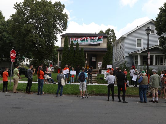 Members of Take Back the Land and supporters held a rally at Liz McGriff's home on Cedarwood Terrace. 