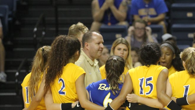 Angelo State University head volleyball coach Chuck Waddington addresses his team during a Lone Star Conference match against Tarleton State at the Junell Center on Wednesday, Sept. 20, 2017.