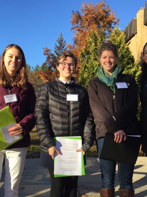 Students Emma Cannon, Corinne Harvey, Emily Taylor and Samantha Chinigo were asking South Burlington residents to take a poll as part of a class at St. Michael's College on Tues, Nov. 8, 2016.