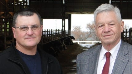 
U.S. Representative Tom Petri, right, received the Friend of Farm Bureau Award while at the Kevin Krentz farm in the town of Aurora. The annual award is given to members of Congress nominated by their home state farm bureaus and approved by the American Farm Bureau Federation board of directors.
