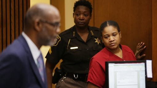 Mitchelle Blair, right, appears in court before Wayne Circuit Court Judge Dana Hathaway on Monday, June 29, 2015 in Detroit. Blair pleaded guilty Monday to killing two of her children and storing their bodies in a home freezer, telling a judge that she had no remorse for beating and suffocating them. She faces life in prison with no chance for parole. (Romain Blanquart/Detroit Free Press via AP)  DETROIT NEWS OUT; TV OUT; MAGS OUT; NO SALES; MANDATORY CREDIT DETROIT FREE PRESS