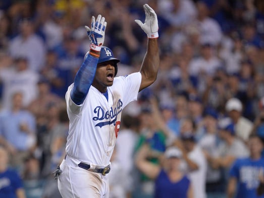 Game 2 at Dodger Stadium: Yasiel Puig celebrates his