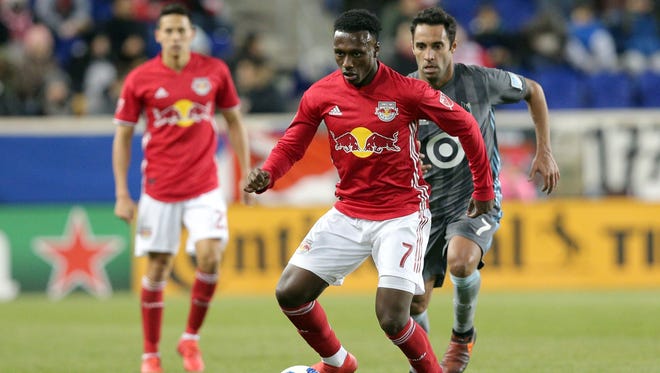New York Red Bulls midfielder Derrick Etienne (7) controls the ball against Minnesota United midfielder Ibson (7) during the second half at Red Bull Arena.