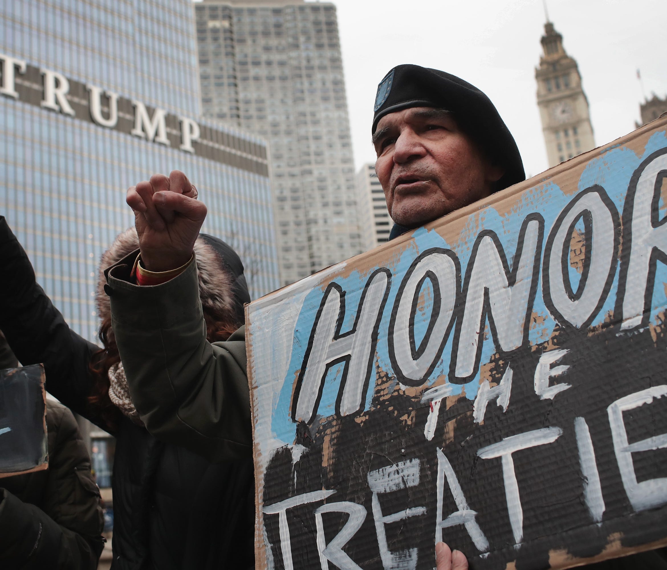 Demonstrators rally near the Trump Tower in Chicago while protesting the construction of the Dakota Access oil pipeline.