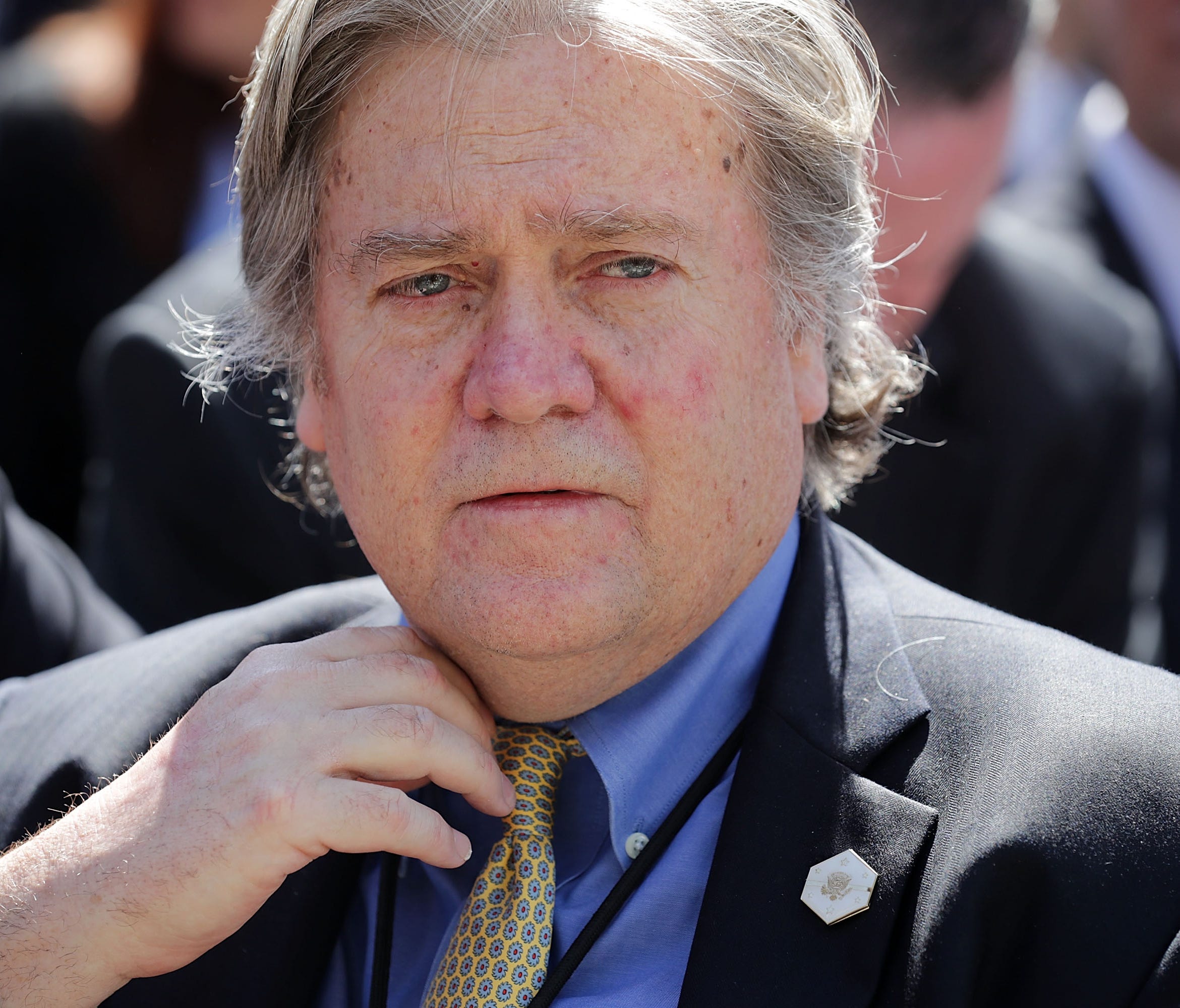 White House adviser Steve Bannon is pictured attending a ceremony at the White House.