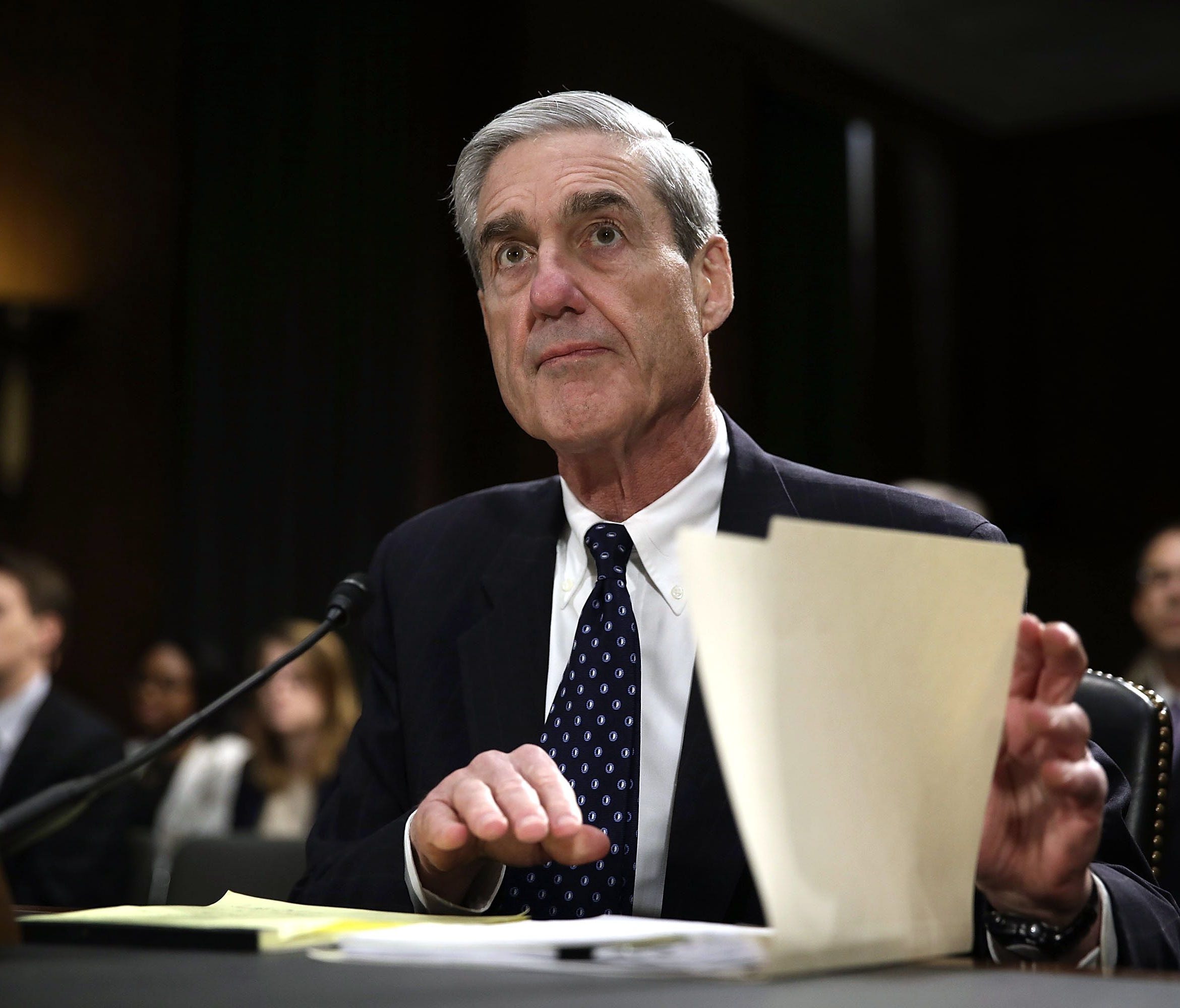 Robert Mueller waits for the beginning of a hearing before the Senate Judiciary Committee on June 19, 2013.