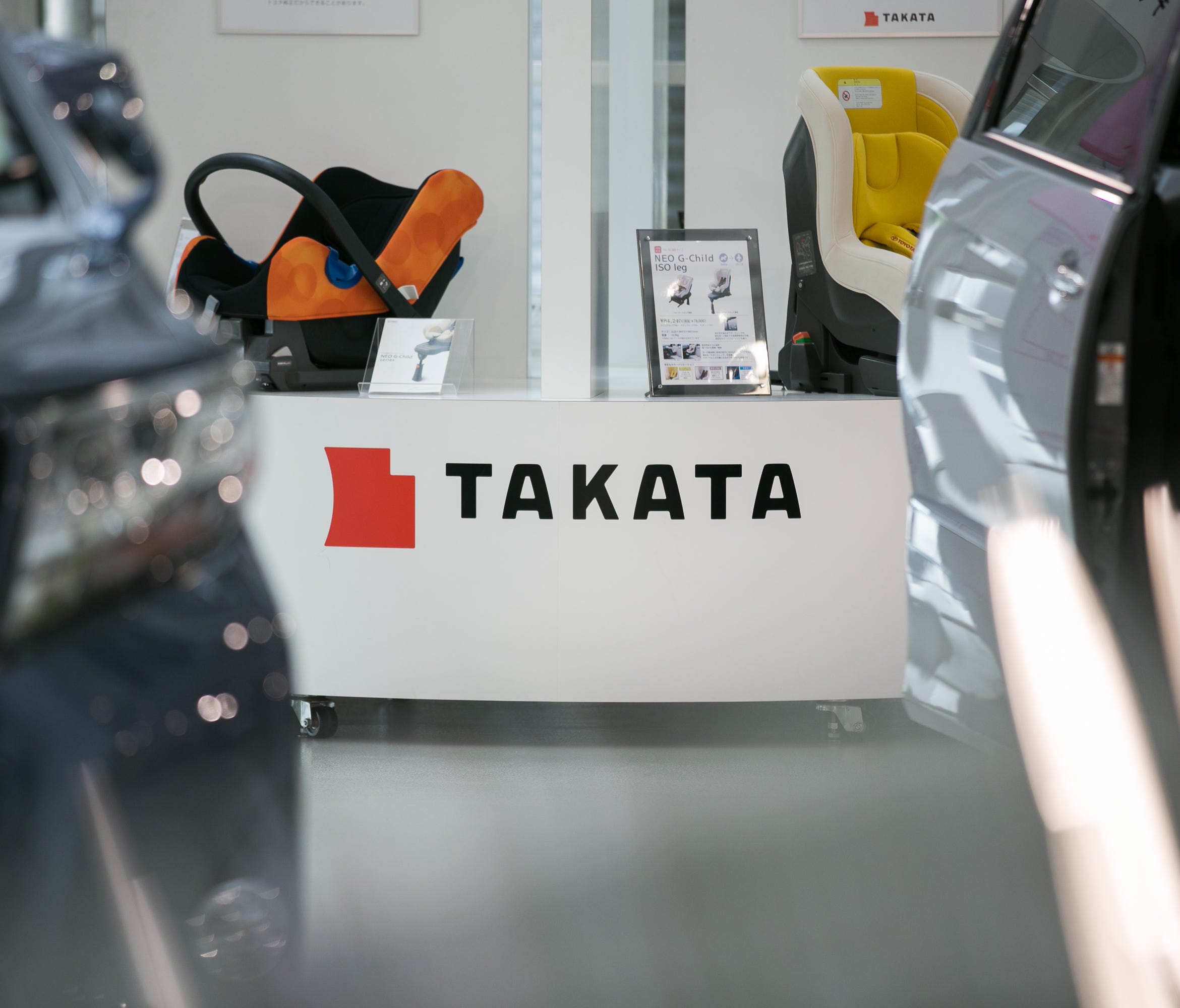 A Takata Corp. logo is seen on a display of child safety seats at a car showroom on June 26, 2017 in Tokyo, Japan. Japanese air bag maker Takata Corp. has filed for bankruptcy protection in Tokyo and the U.S. on June 26, 2017, overwhelmed by the outc