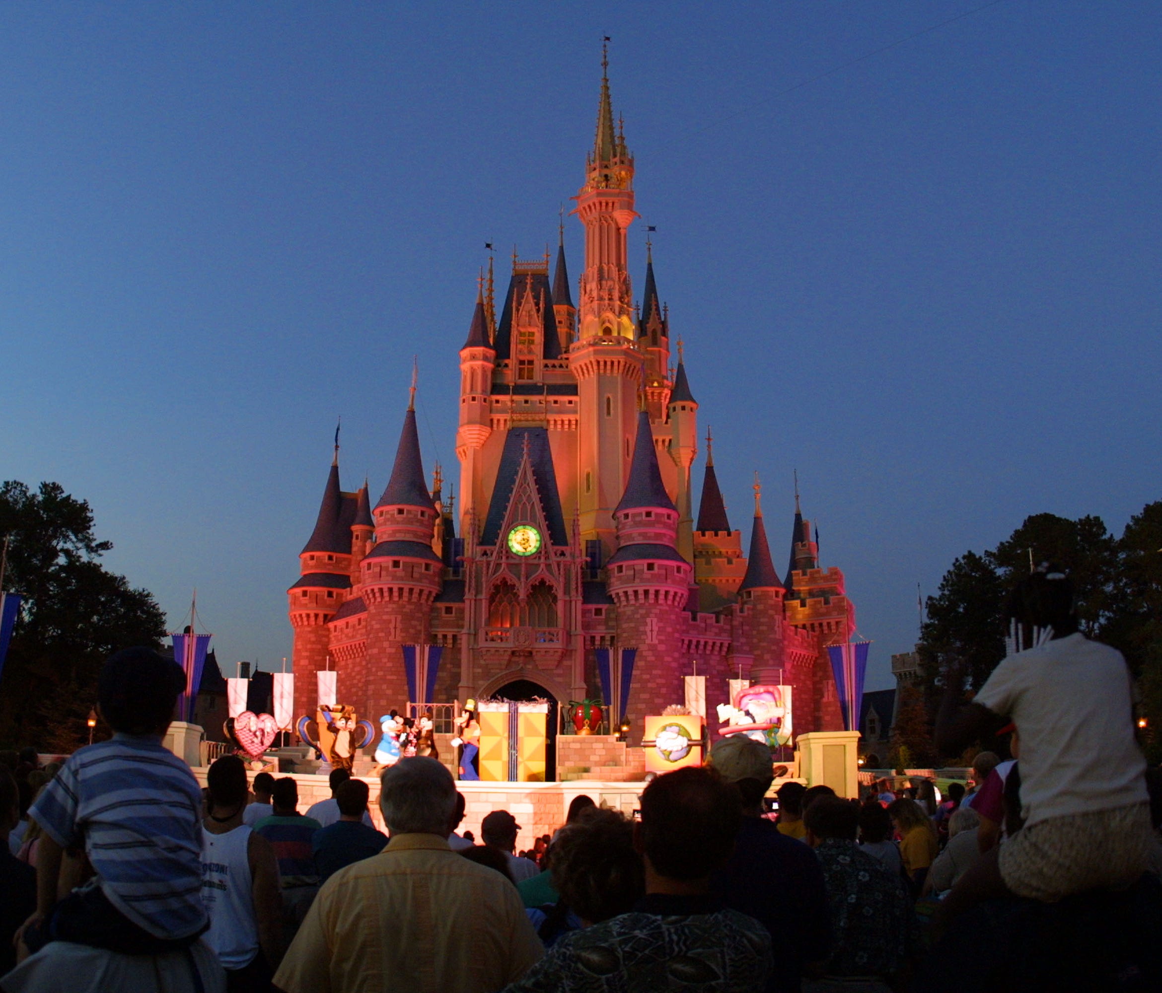 Orlando is the third most booked domestic destination on Expedia in 2017. People watch a show on stage in front of Cinderella's castle at Walt Disney World's Magic Kingdom