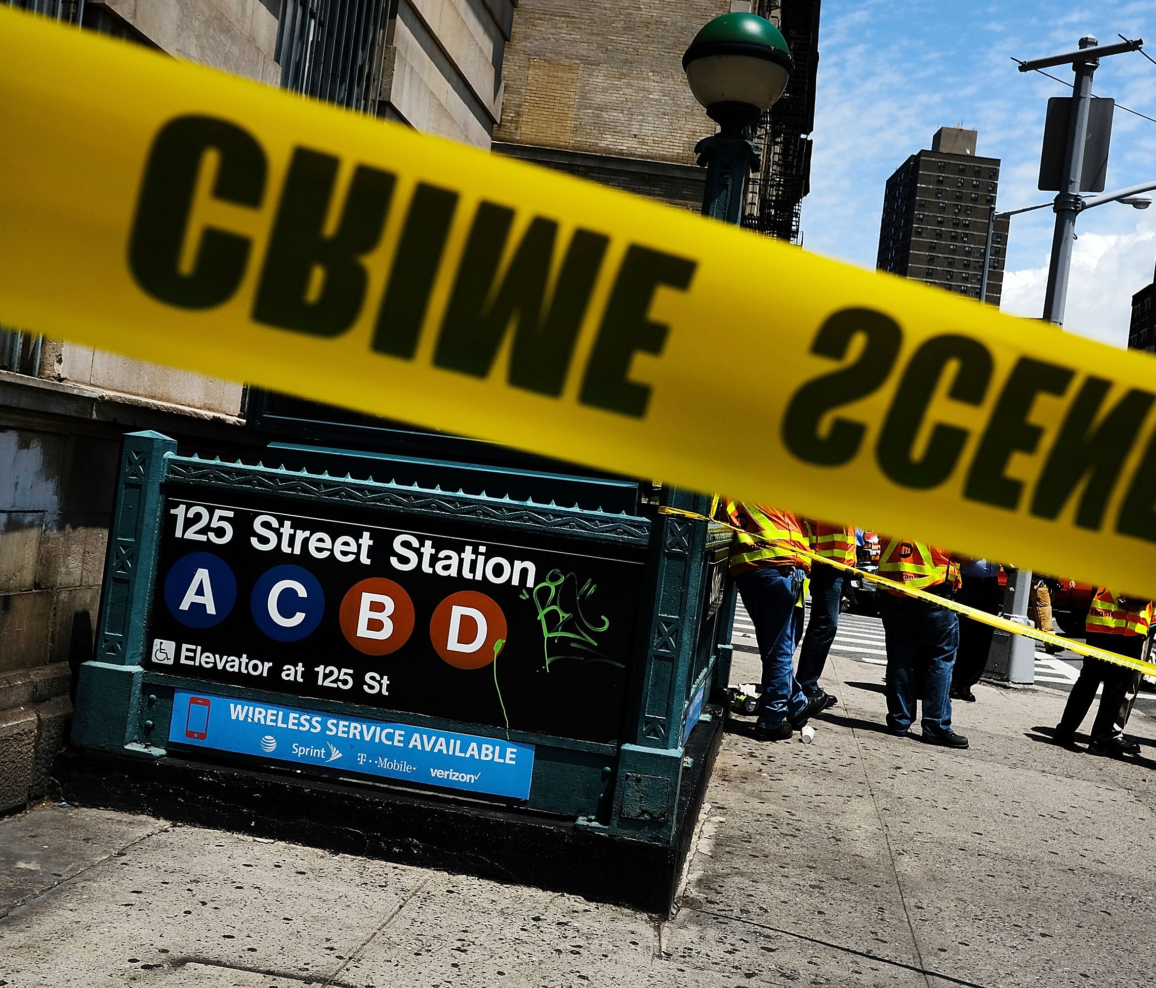 Crime scene tape outside a New York subway station