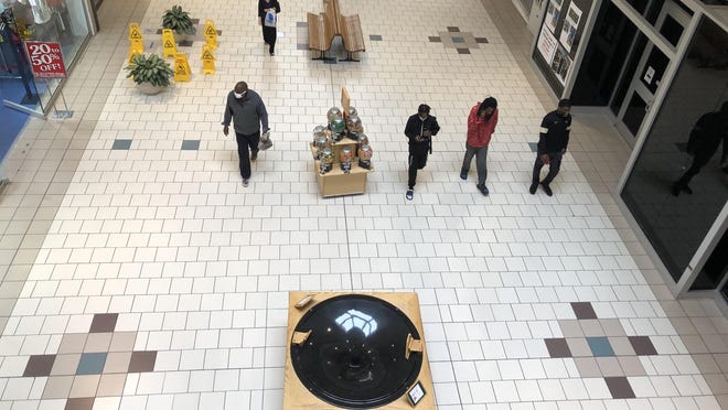 Shoppers are shown Friday morning, Nov. 27, 2020, at Eastridge Mall in Gastonia. The normal, large Black Friday crowds were absent during the morning as local shoppers appeared to mirror the national trend of shoppers staying away due to the coronavirus pandemic.