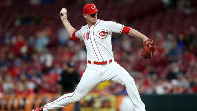 Cincinnati Reds relief pitcher Austin Brice (40) delivers in the ninth inning during a National League baseball game between the New York Mets and the Cincinnati Reds, Tuesday, May 8, 2018, at Great American Ball Park in Cincinnati. Cincinnati won 7-2. 