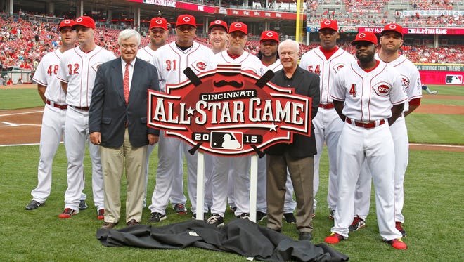 Reds All-Stars past and present, with team president and CEO Bob Castellini, front left, and general manager Walt Jocketty, front right.