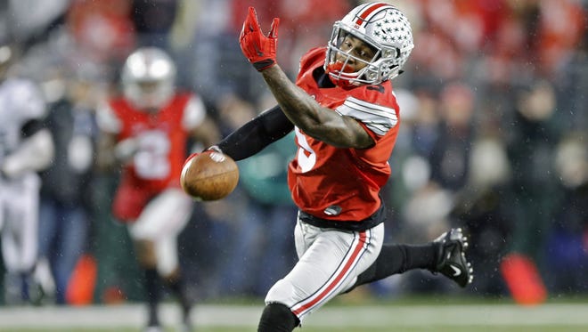 Ohio State wide receiver Braxton Miller (5) can't come up with the catch against Michigan State in the first half on Saturday.