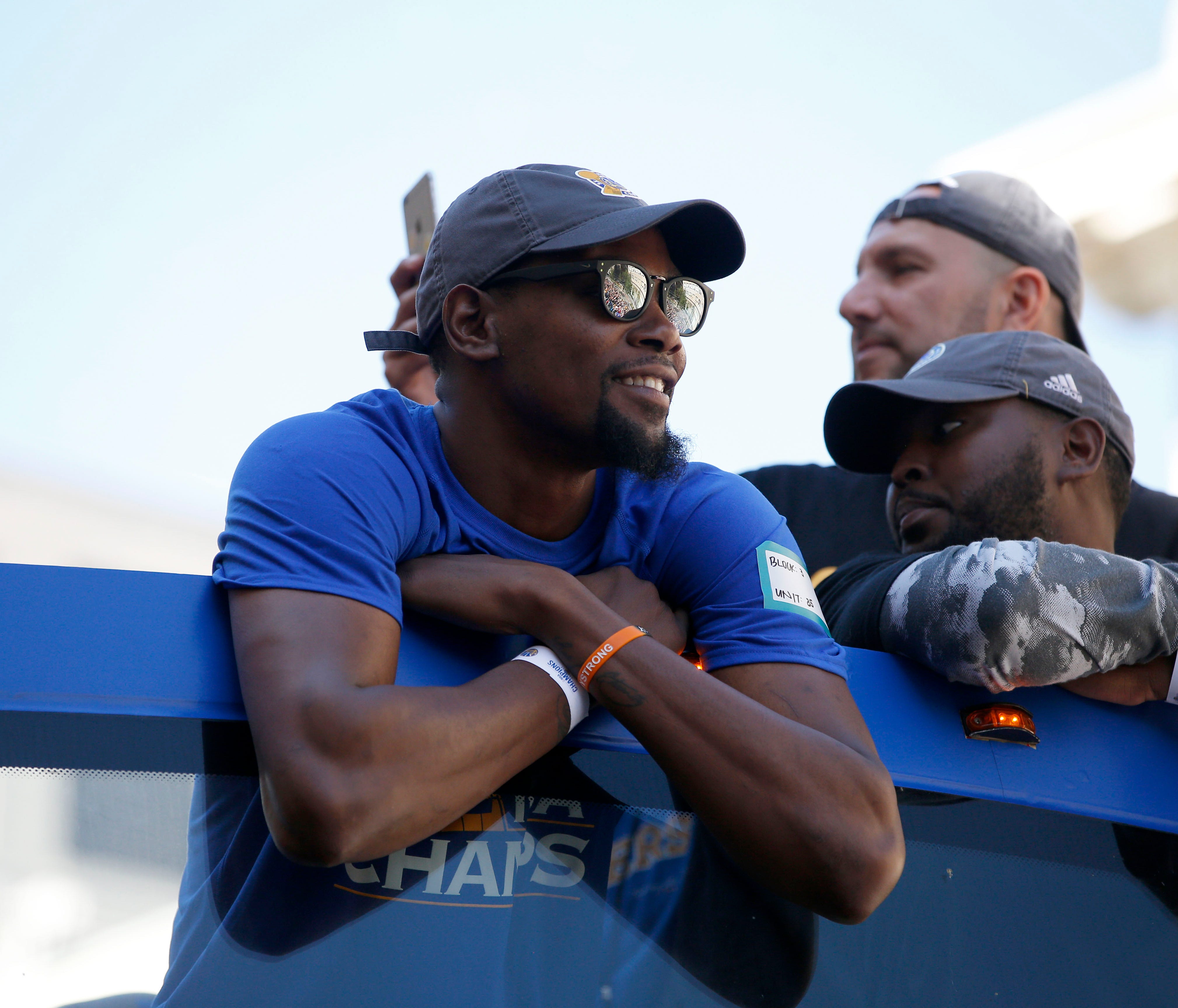 Jun 15, 2017; Oakland, CA, USA; Golden State Warriors forward Kevin Durant smiles during the Warriors 2017 championship victory parade in downtown Oakland. Mandatory Credit: Cary Edmondson-USA TODAY Sports ORG XMIT: USATSI-360408 ORIG FILE ID:  20170