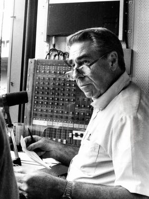 Paul Carey in the broadcast booth in 1990.