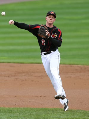 Rochester's James Beresford makes an off balance throw to complete a double play. 