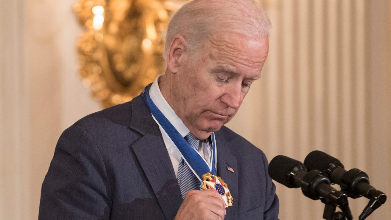 Obama surprises a choked-up Biden with Medal of Freedom