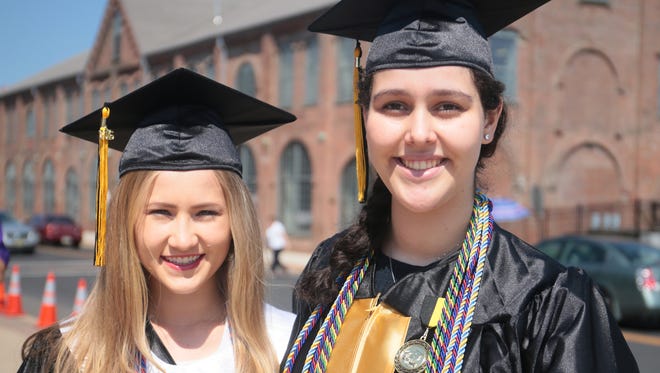 Joanna Gorka, left, and Sarah Zanzoul at the South Brunswick High School graduation at Sun National Bank Center in Trenton on June 21, 2016. 