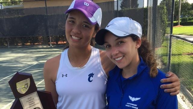Canterbury eighth-grader Emily Javedan, left, stands with senior doubles partner Eve Bailey after clinching a Class A individual state tournament berth.