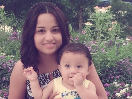Riccy Enriquez Perdomo, 22, of Florence, Kentucky, with her son, Rony, 11 months, has been detained by federal immigration police even though she has legal status, her family members and attorneys say.