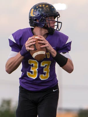 Unioto quarterback Gabe Fisher drops back to pass during an earlier season contest against Paint Valley. Fisher's Shermans beat Westfall Friday night by a 34-7 final.