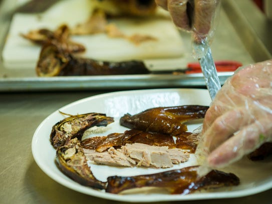 Preparation of Peking duck. The Chinese American Community