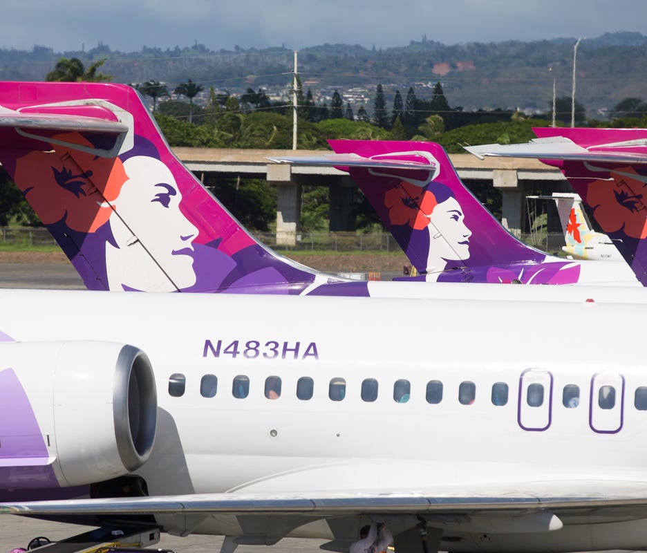 Hawaiian Airlines Boeing 717 jets park at the inter-island terminal at Honolulu International Airport on Nov. 8, 2017.