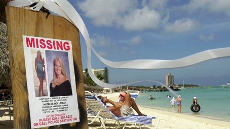 This June 10, 2005, photo shows a missing poster for Natalee Holloway.