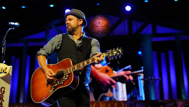 Kristian Bush performs at the Grand Ole Opry in July.