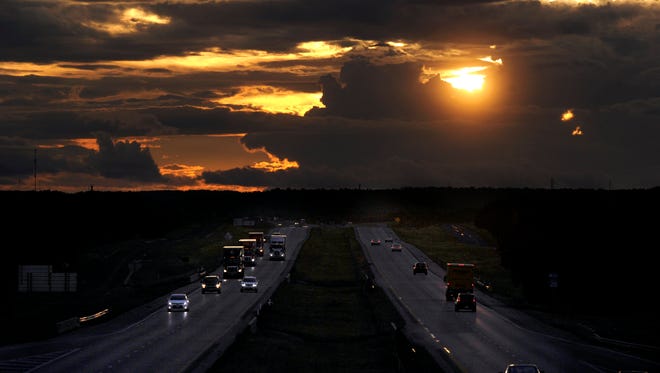 The sun sets over Interstate 20 near Putnam.