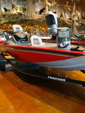 A modified V Hull aluminum bass boat at Bass Pro Shops on Monday, June 18, 2018. This type of boat is designed to cut through the water instead of over it, is fairly short and comes in various lengths and typically has a motor with 60 to 70-horsepower, allowing speeds of 30-35 miles per hour.