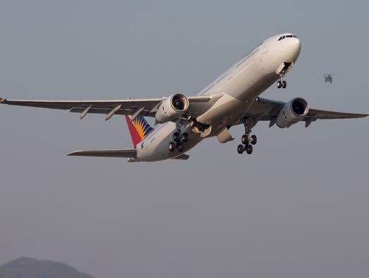 A Phillipines Airbus A330 takes off from Hong Kong