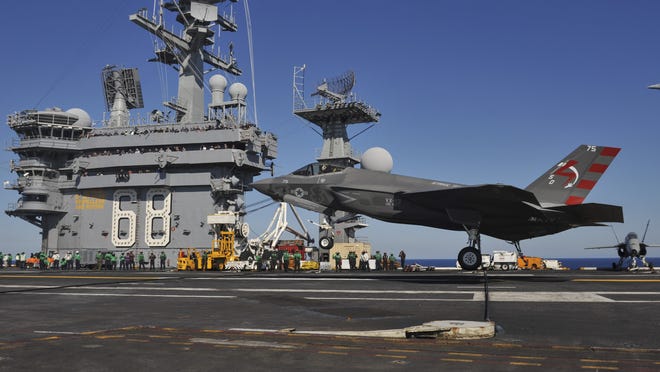 An F-35C Lightning II is shown aboard the aircraft carrier Nimitz in November in the Pacific Ocean. The F-35 program is “eating the defense budget alive,” an analyst told the House Armed Services Committee on Feb. 11.