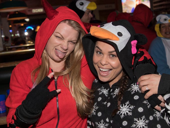 A photograph taken during the Onesie Crawl held on