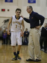 Clarkston's Foster Loyer listens to instructions from