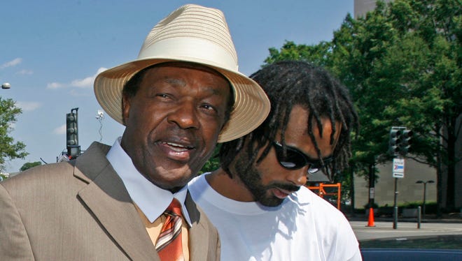 Former Washington Mayor Marion Barry, second from right, with his son Christopher Barry, far right.