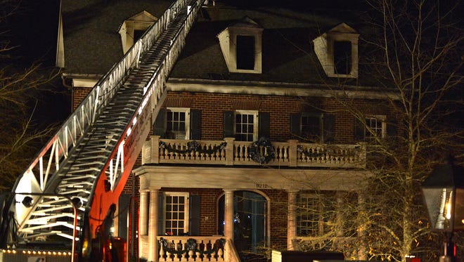 A ladder from a Charlotte Fire Department hook-and-ladder truck is shown outside Ron Rivera's house on Jan. 5.