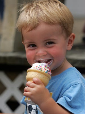 Cole Ferro of Chatham eats ice cream and smiles at Point Pleasant Beach in this 2007 file photo.