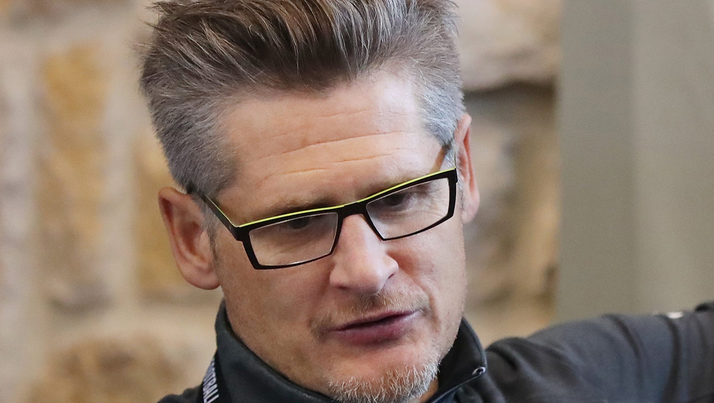 Atlanta Falcons general manager Thomas Dimitroff speaks with a reporter during media availability Tuesday, Jan. 31, 2017 at Memorial City Mall ice arena in Houston, Texas.