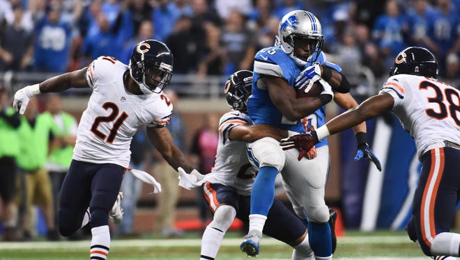Detroit Lions running back Theo Riddick runs the ball against the Chicago Bears on Oct. 18, 2015, at Ford Field.