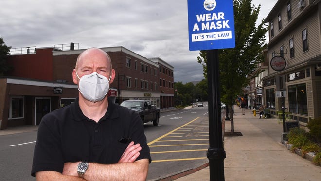 Town Administrator Todd Selig reminds people that wearing masks is the law in Durham, home to the University of New Hampshire campus.
